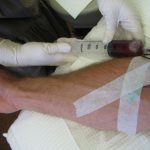 large syringe via IV